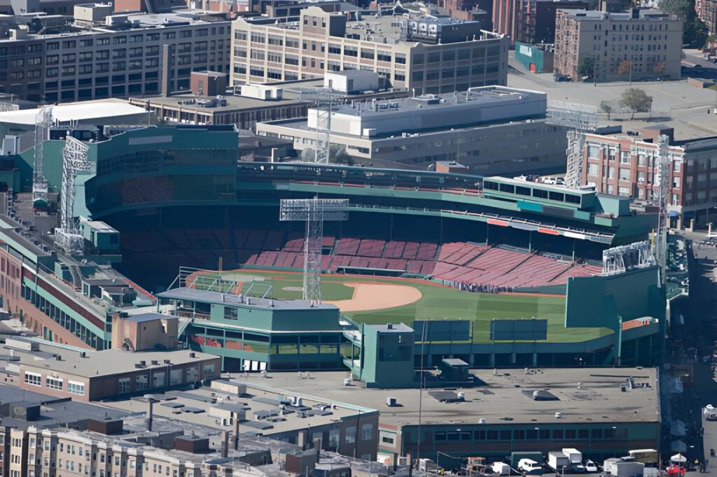 Modern brick campus building with angled red walls.
