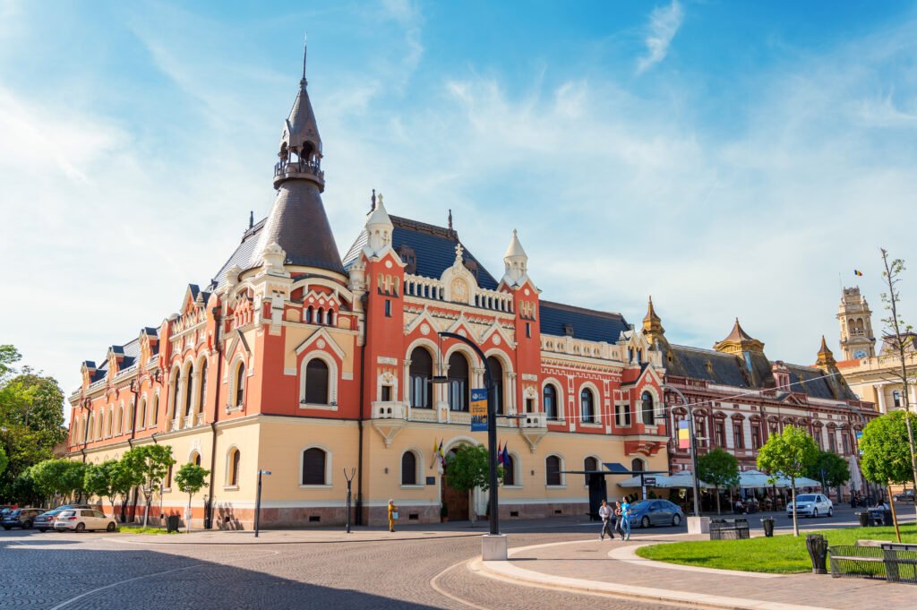 Ornate colorful palace on a sunny public square.