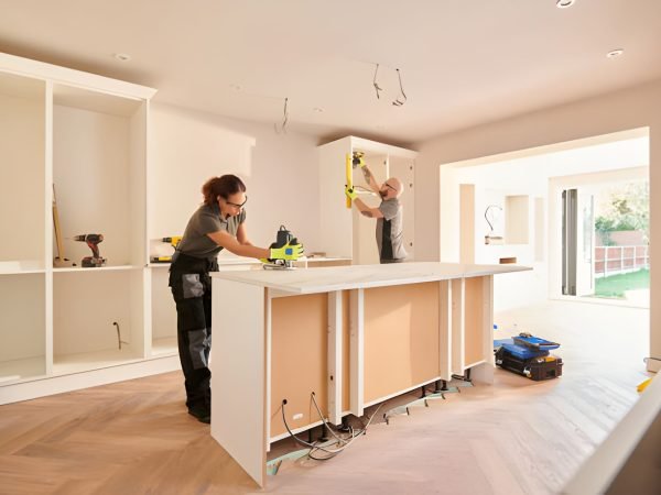 kitchen fitters installing some cabinets